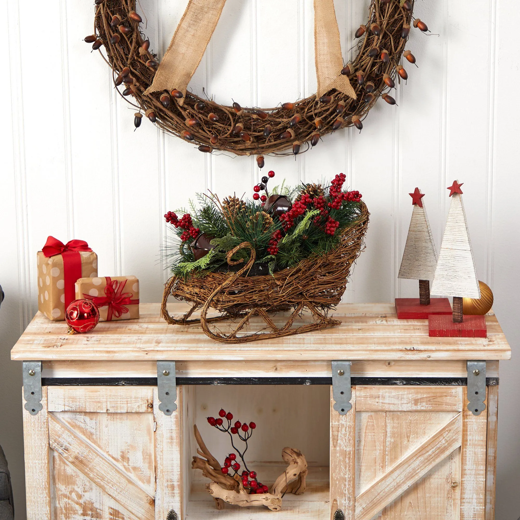 18” Christmas Sleigh with Pine, Pinecones and Berries Artificial Christmas Arrangement