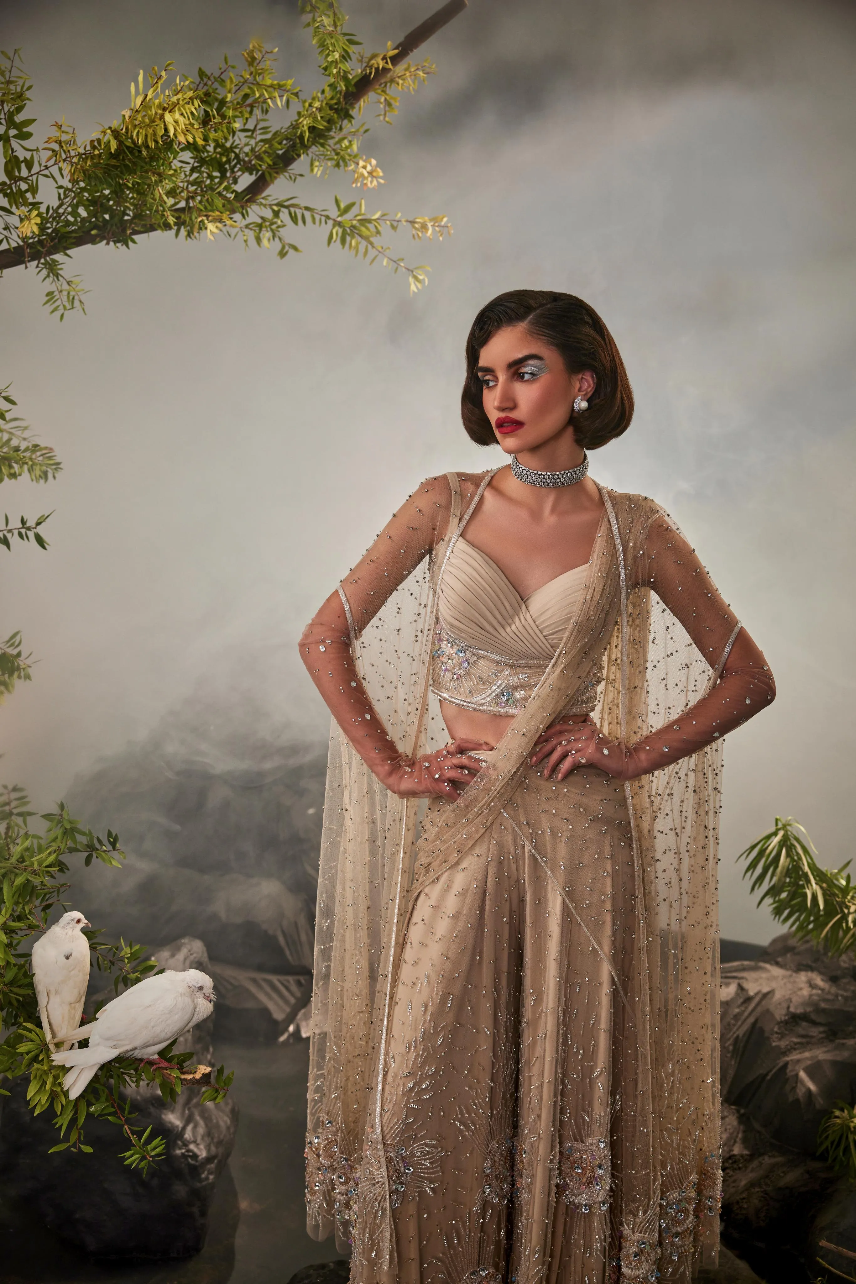 Champagne sharara sari with pleated blouse and cape