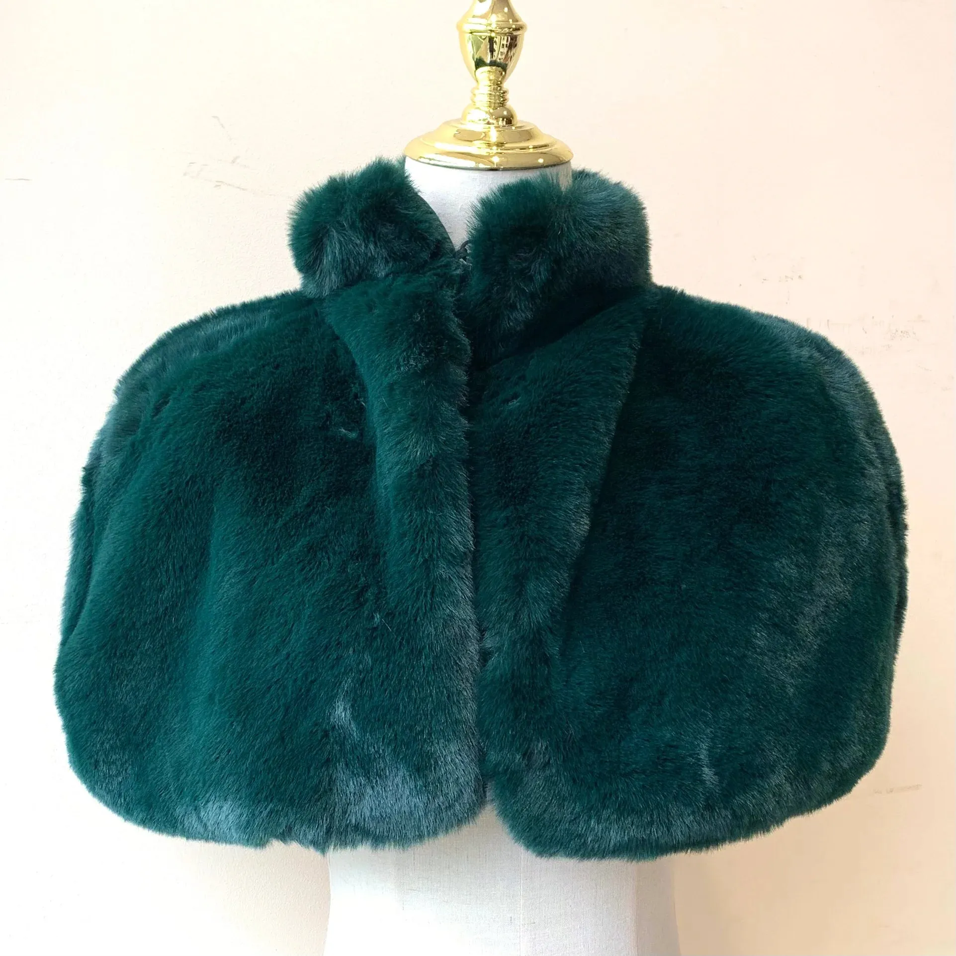 Faux Fur Cape with high neck effect. All Colours