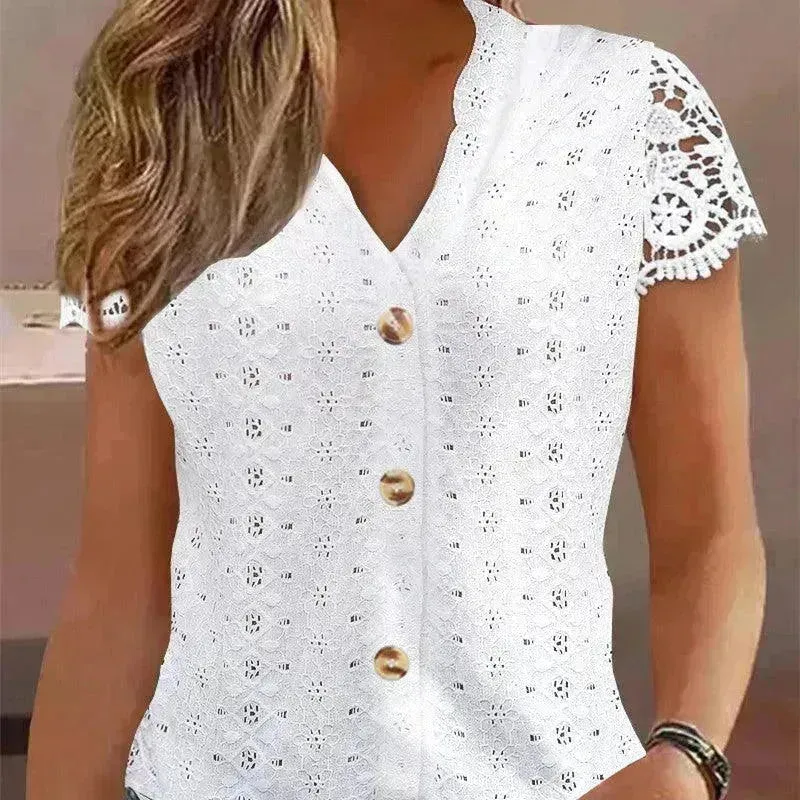 Women Short sleeved button down white lace top.